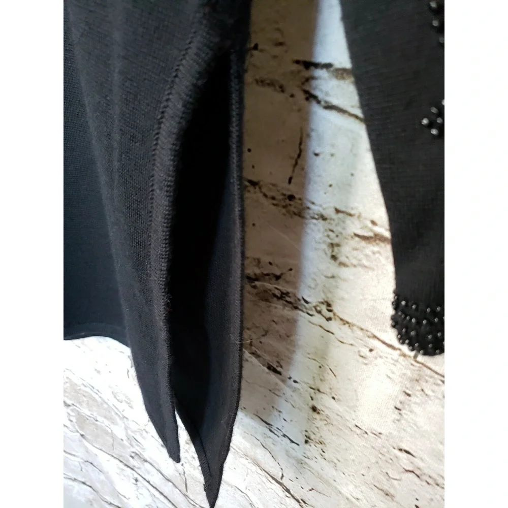 Woman's Theomiles  Black sweater with beaded sleeves sz M